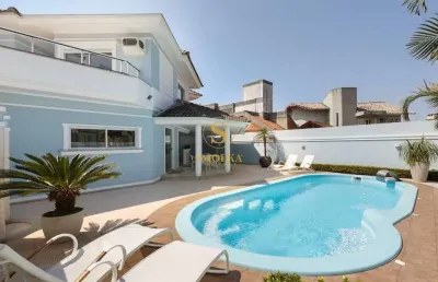 Casa em condomínio fechado com 4 quartos para alugar na rua dos cumurupis, jurerê internacional, florianópolis, 300 m2 por r$ 22.000