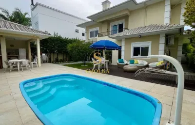 Casa em condomínio fechado com 4 quartos à venda na rua dos meros, jurerê internacional, florianópolis, 296 m2 por r$ 4.200.000