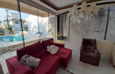 Casa em condomínio fechado com 4 quartos à venda na rua da saracura, pedra branca, palhoça, 200 m2 por r$ 1.500.000