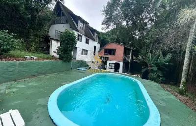 Casa em condomínio fechado com 5 quartos à venda na rua hercilio nicolau dos santos, guarda do imbau, palhoça, 200 m2 por r$ 950.000