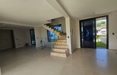 Casa em condomínio fechado com 3 quartos à venda na rua das piraúnas, jurerê, florianópolis, 222 m2 por r$ 3.800.000