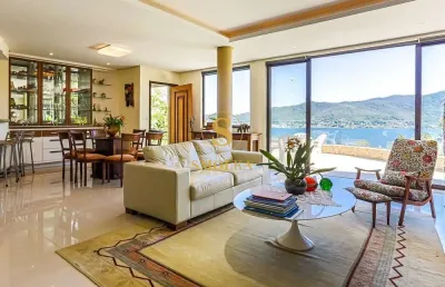 Casa em condomínio fechado com 5 quartos à venda na servidão caminho do pescador, lagoa da conceição, florianópolis, 400 m2 por r$ 4.000.000