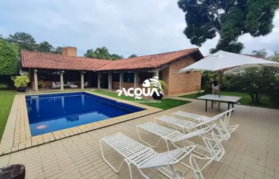 Casa em condomínio fechado com 4 quartos para alugar no Jardim Acapulco, Guarujá 