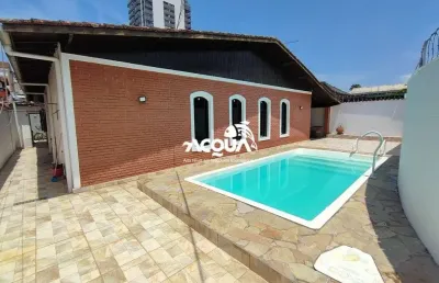 Casa em condomínio fechado com 4 quartos para alugar na Enseada, Guarujá 