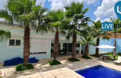 Casa térrea, alto padrão, 4 suítes e piscina no parque da fazenda