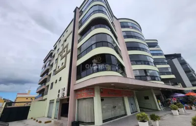 Amplo apartamento em bombinhas de frente para avenida