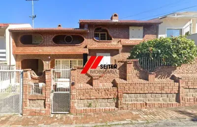 Casa com 4 quartos à venda no Coqueiros, Florianópolis 