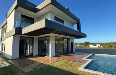 Residência moderna com elevador, piscina e vista panorâmica  condomínio completo com campo de golf