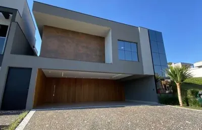 Essa luxuosa casa  de 3 suítes está à venda em valinhos, no cond. mont alcino um excelente condomínio relativamente pequeno e muito seguro