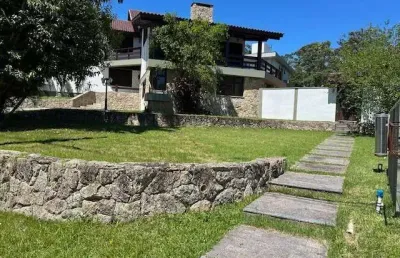 Casa em condomínio fechado com 4 quartos à venda na Rodovia Haroldo Soares Glavan, 1900, Cacupé, Florianópolis