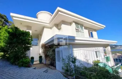 Casa em condomínio fechado com 5 quartos para alugar na Rodovia Haroldo Soares Glavan, 910, Cacupé, Florianópolis