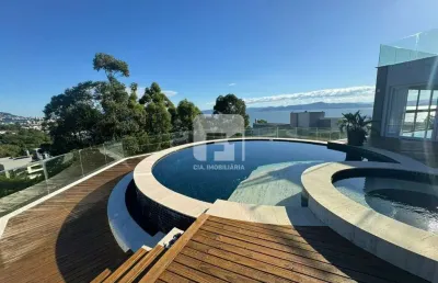 Casa em condomínio fechado com 7 quartos para alugar na Rodovia Haroldo Soares Glavan, 4450, Cacupé, Florianópolis