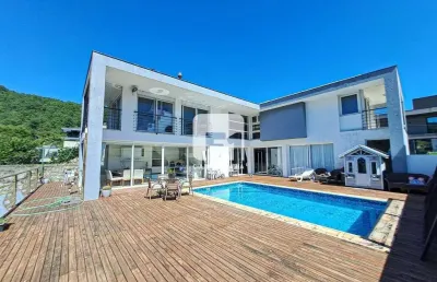 Casa em condomínio fechado com 4 quartos para alugar na Rodovia Admar Gonzaga, 3180, Itacorubi, Florianópolis