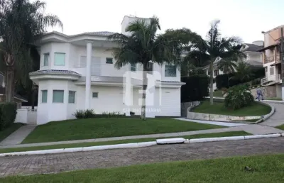 Casa em condomínio fechado com 4 quartos à venda na Rodovia Haroldo Soares Glavan, 929, Cacupé, Florianópolis