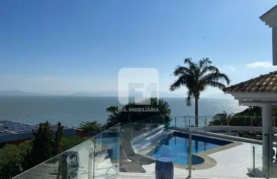 Casa em condomínio fechado com 6 quartos à venda na Rodovia Haroldo Soares Glavan, 4450, Cacupé, Florianópolis