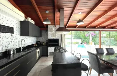 Casa com 5 quartos para alugar na Rua das Guarajubas, 30, Jurerê Internacional, Florianópolis