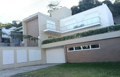 Casa em condomínio fechado com 4 quartos para alugar na Rodovia Admar Gonzaga, 3180, Itacorubi, Florianópolis