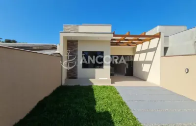 Casa com 03 quartos, com amplo espaço de terreno nos fundos no centro de itapoá
