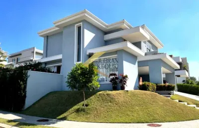 Casa encantadora à venda no swiss park, 3 suítes com closet e varanda, garagem para 6 carros