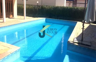 Casa para venda/aluguel no alphaville campinas, 5 dormitórios (4 suítes), piscina e garagem para vários carros.