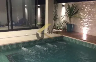 Casa à venda em condomínio de hortolândia, 4 suítes, piscina e 4 garagens