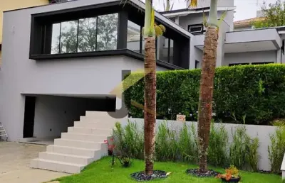 Casa à venda em condomínio de valinhos, 3 suítes (1 master com closet), 6 garagens. com 3 salas, lavabo, ampla cozinha, despensa, churrasqueira com fo