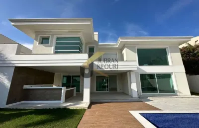 Casa à venda no alphaville campinas, 4 suítes com closet (master com spa), espaço gourmet com churrasqueira e piscina.