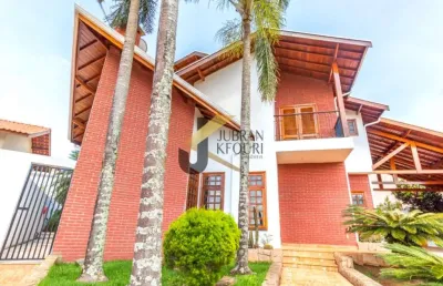 Casa à venda em condomínio próximo ao shopping galleria - campinas, com 4 suítes (2 americanas) lazer e garagem para 7 veículos.