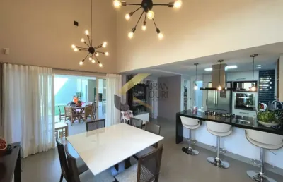 Casa em condomínio à venda em jaguariúna com  5 dormitórios (4 suítes climatizadas - máster com closet) terraço gourmet e garagem para vários carros.