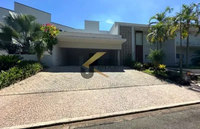 Casa em condomínio à venda no residencial villa lombarda - valinhos, 4 suítes com closet (1 térrea), lazer comum e garagem para 6 carros com oficina.