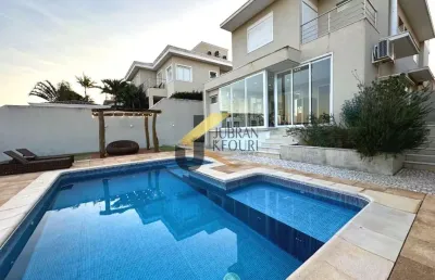 Casa à venda no alphaville dom pedro - campinas, com 3 suítes, lazer privativo com piscina e garagem para 4 carros.