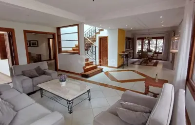 Casa residencial com 4 suítes e 385m² privativos em jurerê internacional, florianópolis
