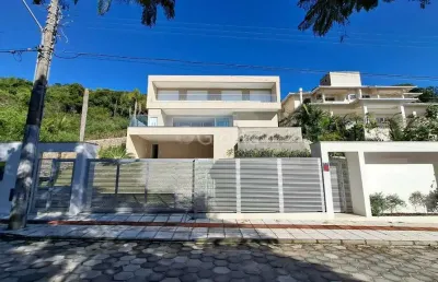 Casa com 4 suítes no bairro praia brava, florianópolis - sc
