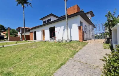 Casa em condomínio fechado com 4 quartos para alugar na alameda das tulipas, 23, alphaville, santana de parnaíba por r$ 18.400