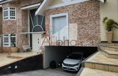 Casa em condomínio fechado com 4 quartos à venda na alameda das tulipas, 170, alphaville, santana de parnaíba por r$ 3.600.000
