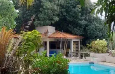 Casa sítio do lado da praia em condomínio com 2000m2 e  7/4  com 5 suítes  e piscina, espaço gourmet  e muito verde com árvores frutíferas