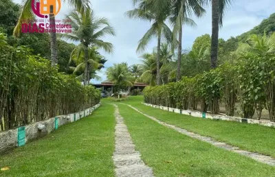 Sítio à venda  com 10.000m² com casa sede com piscina em barra de jacuípe com 5/4 , suítes  - praia e rio
