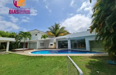 Linda casa com 2 terrenos com 1000m2 de área total  com piscina, sauna, espaço gourmet com churrasqueira, campo de futebol, 4 suítes completas  em alphaville  litoral  norte- casa  em condomínio dúple