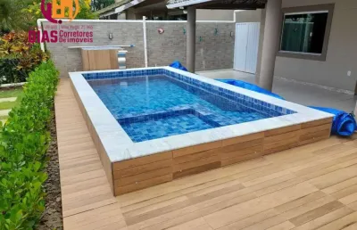 Vendo linda casa com 4/4, sendo 3 suítes completas com piscina particular, espaço gourmet em condomínio com total infraestrutura: picina, academia, lagoa e outros