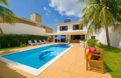 Casa de praia espetacular, 6/4 sendo 4 suítes, área externa maravilhosa. condomínio canto do sol