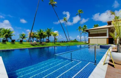 Village beira mar encantador na praia de itacimirim - ba