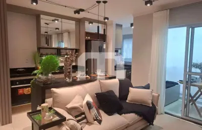 Apartameno a venda de 55 m², 2 dormitórios, ampla sala 2 ambientes com churrasqueira e 1 vaga.