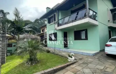 Casa com 4 quartos à venda na filomena spinatt, 423, são ciro, caxias do sul por r$ 1.100.000