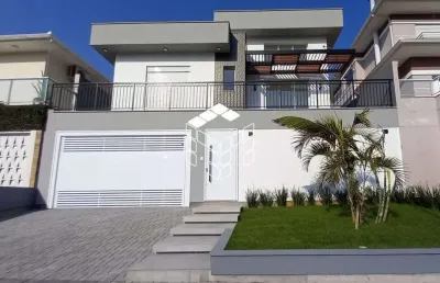 Casa em condomínio fechado com 3 quartos à venda na rua das perdizes, 4, pedra branca, palhoça por r$ 1.790.000