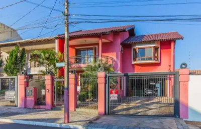 Casa com 3 quartos à venda na rua bélgica, 29, marechal rondon, canoas por r$ 2.100.000