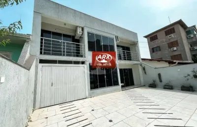 Casa com 3 quartos à venda na euclides da cunha, 280, centro, canoas por r$ 950.000