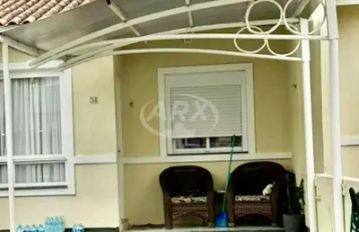 Casa em condomínio fechado com 2 quartos à venda na rua santa júlia, 55, olaria, canoas por r$ 370.000