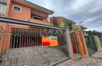 Casa com 3 quartos à venda na rua bélgica, 65, marechal rondon, canoas por r$ 1.170.000