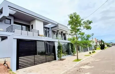 Casa com 4 quartos à venda na rua bélgica, 100, marechal rondon, canoas por r$ 2.490.000