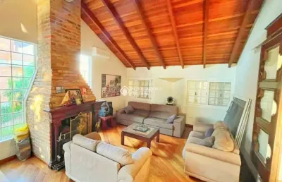 Casa em condomínio fechado com 3 quartos à venda na rua tocantins, 937, lomba do pinheiro, porto alegre, 291 m2 por r$ 1.586.900